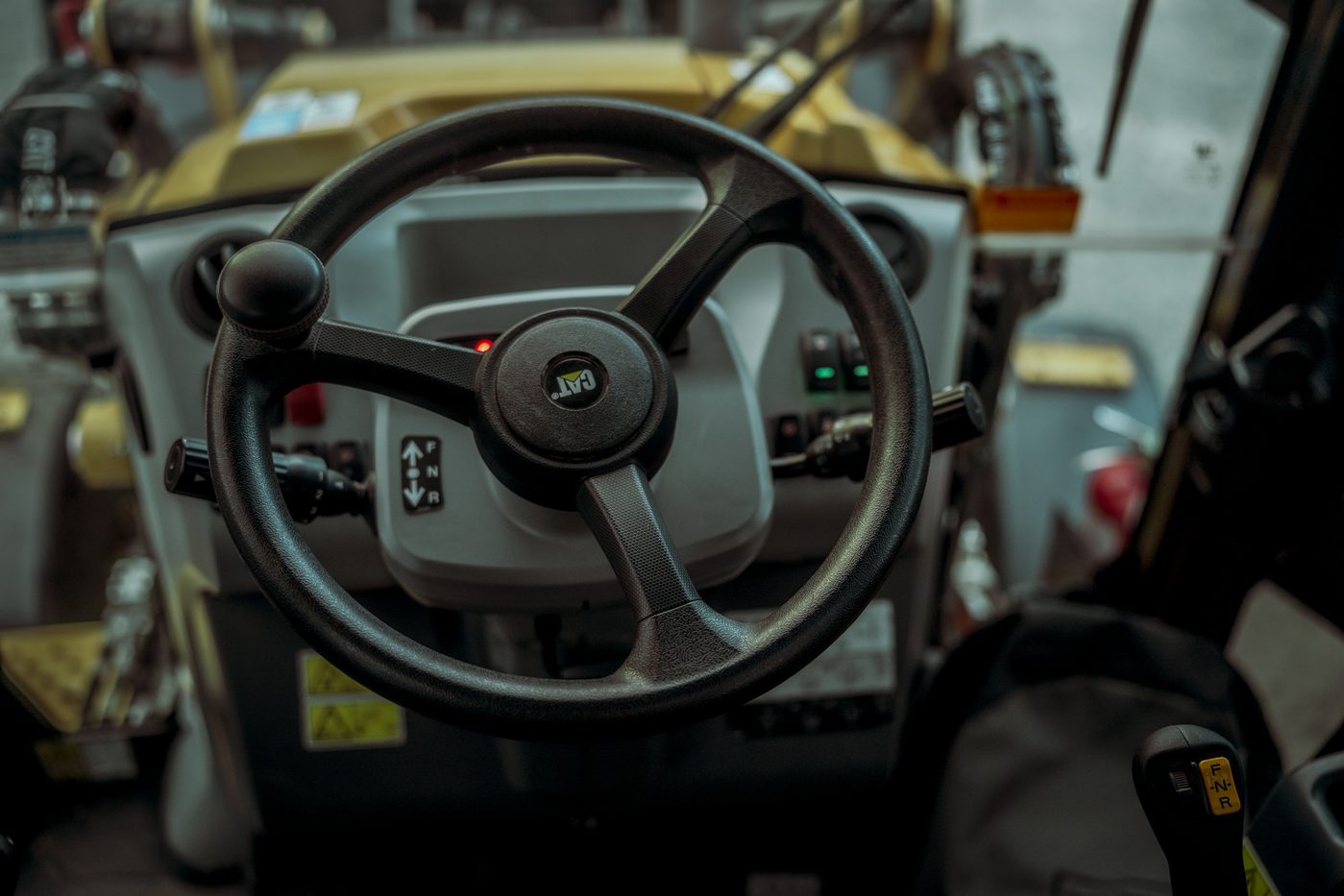 Steering wheel and cab interior
